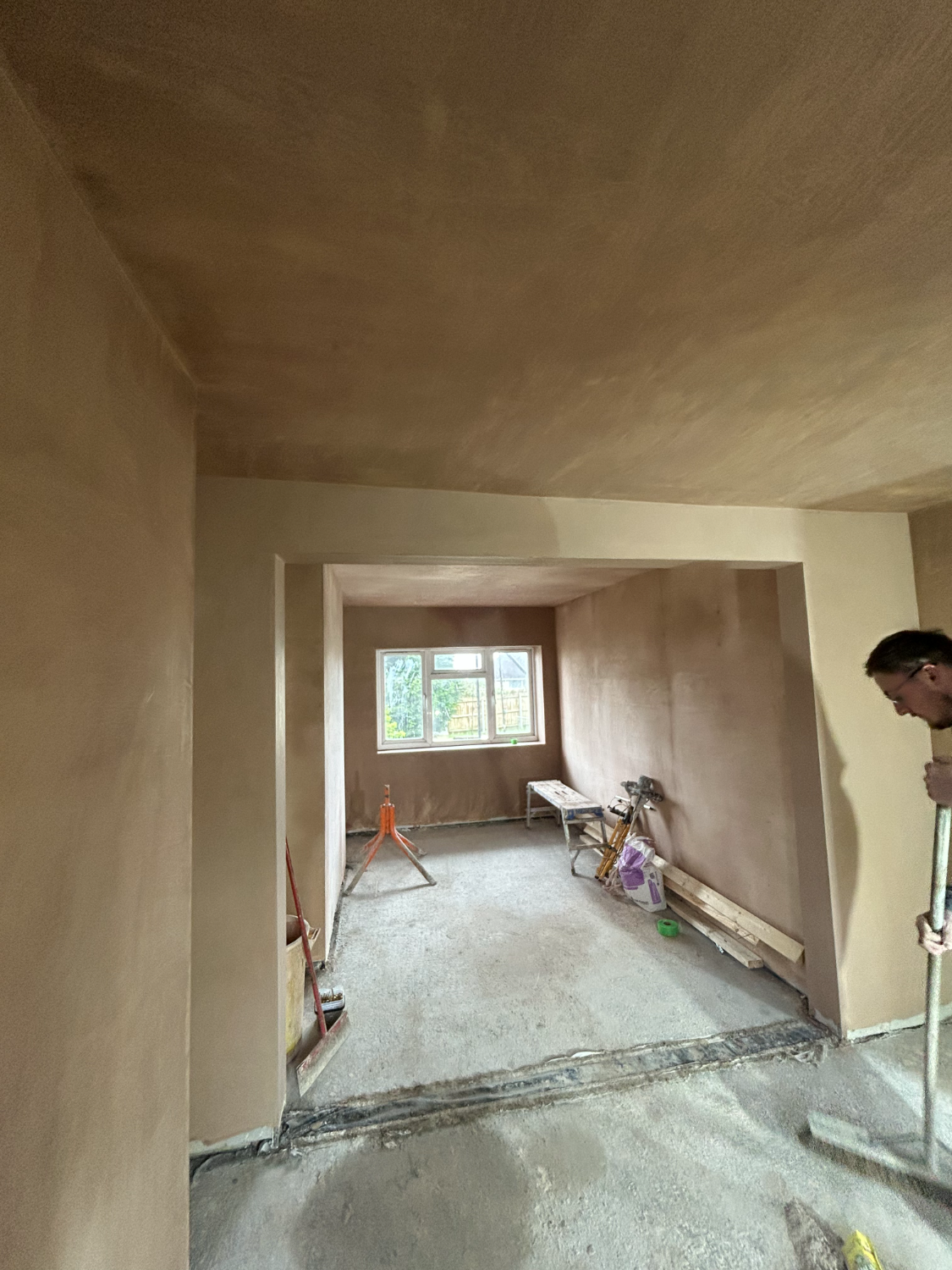 Plastered room with finished window reveals