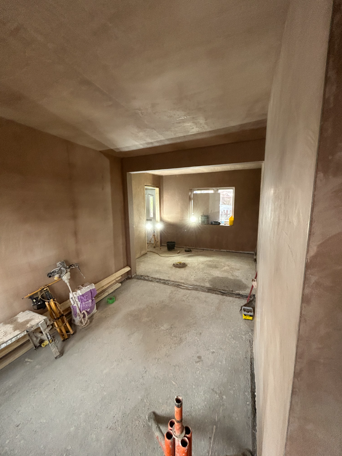 Plastered room with two formed openings