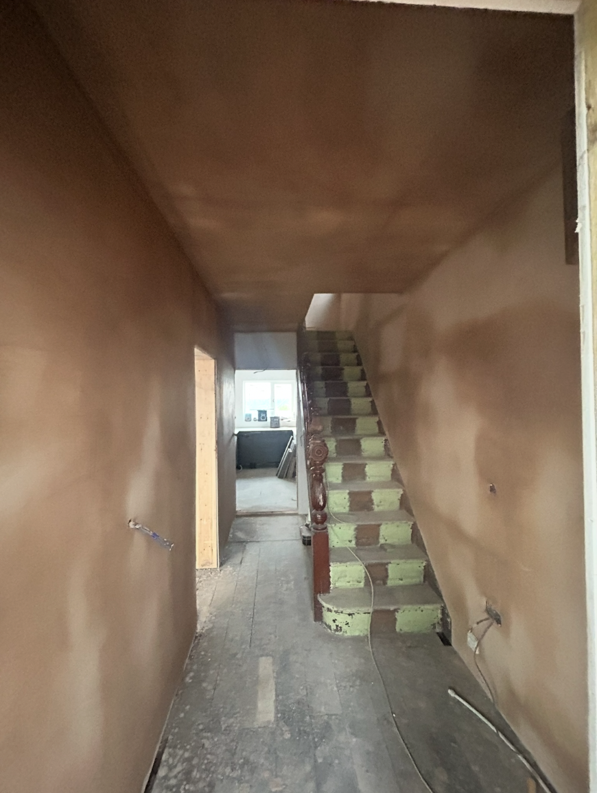 Plastered hallway and stairwell ready for decorating